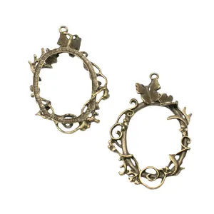 Vintage bronze alloy oval garland pendants with butterfly and vine motifs for DIY jewelry