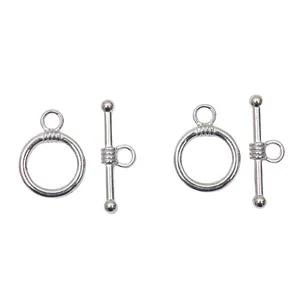 Close-up of vintage silver alloy OT toggle clasps for DIY jewelry making and connectors