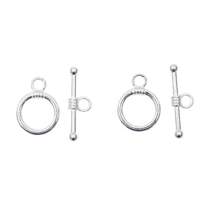 Close-up of polished vintage silver alloy OT toggle clasp connectors for DIY jewelry making