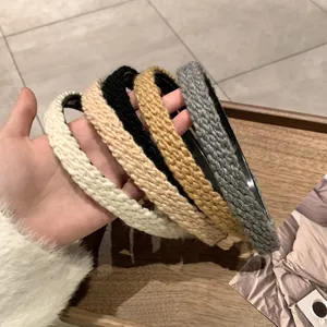 Five-piece set of knitted winter headbands in beige apricot black yellow and grey