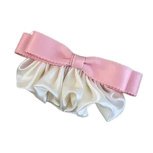 Nœud papillon rose élégant avec dentelle crème et finition satinée pour cheveux