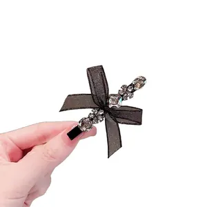 Elegant Korean style black lace bow hair clip with sparkling crystal rhinestone accents