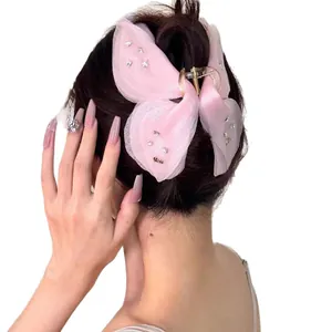 Pince à cheveux papillon en tulle rose élégante avec strass brillants pour femmes