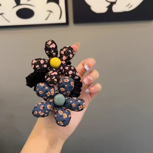 Floral fabric hair scrunchies with large 3D flowers for sweet women ponytail styling