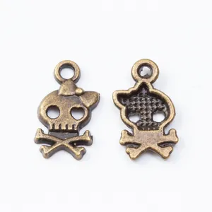 Vintage bronze skull and crossbones alloy pendants with bows for DIY jewelry making