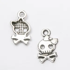Vintage silver skull and crossbones metal pendants with Kuromi style details