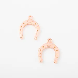 Pair of rose gold horseshoe charms in zinc alloy for DIY jewelry necklace making