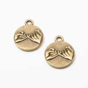 Vintage bronze round hand-holding pendant for DIY jewelry necklace and bracelet making