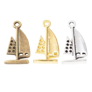 DIY zeilboot hangers in brons goud en zilver met glanzende kristallen accenten
