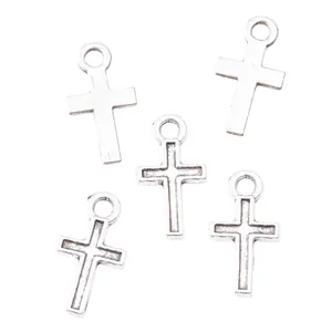 Set of five vintage silver zinc alloy cross pendants for DIY jewelry making and crafts