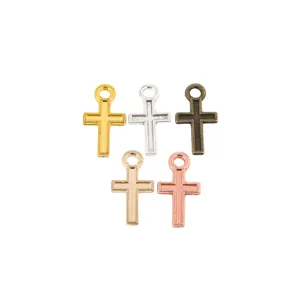 Set of five vintage zinc alloy cross pendants in assorted metallic plating colors