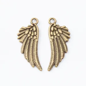 Vintage bronze alloy angel wing pendants with detailed feathers for DIY jewelry making