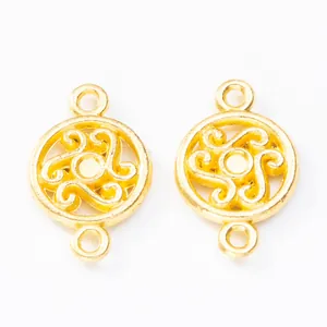 Pair of gold circular spiral swirl connectors for DIY vintage jewelry making