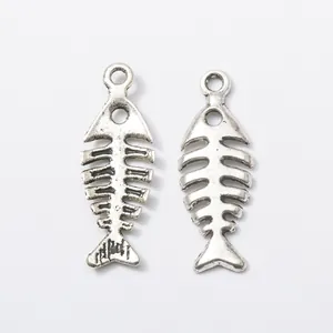 Pair of vintage silver fishbone charms made of alloy for DIY jewelry and necklace making
