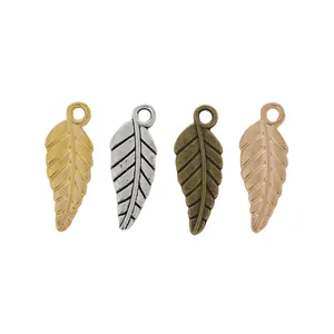 Set of four vintage alloy leaf pendants in gold, silver, bronze and rose gold for DIY jewelry