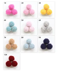 Close-up of assorted colorful wool felt balls for DIY jewelry and accessory making