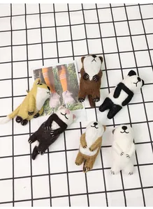 Detailed set of six handmade wool felt animal brooches including panda and cat figures
