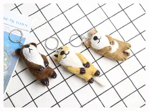 Vue détaillée de porte-clés en feutre de laine faits main avec loutre, renard et corgi