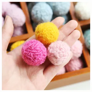 Handmade large wool felt pom poms in candy colors for DIY jewelry and hair accessories