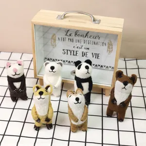 Handmade wool felt animal dolls set including cute panda, fox and bear on checkered cloth