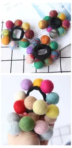 Detail of colorful handmade wool felt balls on high-elastic black hair ties for women