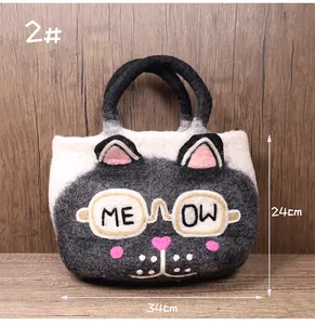 Detailed view of the cat felt tote bag with 34cm width and 24cm height dimensions