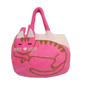 Detail of pink and white wool felt tote bag with a cute sleeping cat illustration