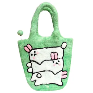 Handmade wool felt rabbit handbag in grass green with cute cartoon animal decorations