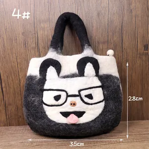Detail view of felt tote bag showing cat face pattern and size dimensions 35x28cm