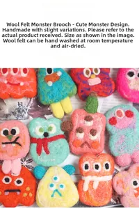 Detailed close-up of handmade felt monster brooches showing soft wool texture and fibers