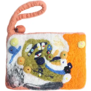 Handmade wool felt wristlet pouch with colorful abstract art patterns and beaded details
