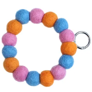 Colorful wool felt ball keychain loop with pink blue orange beads and metal ring