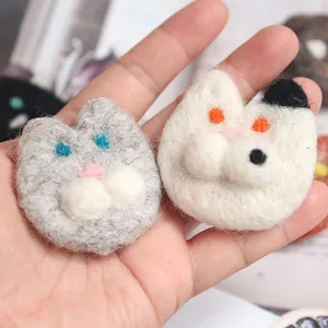 Handmade wool felt cat brooches in grey and bicolor patterns for clothing accessories