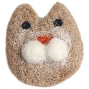 Cute handmade wool felt cat head brooch featuring brown fiber texture and soft details