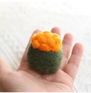 Detailed view of handmade needle felt sushi ornament showing wool fiber texture