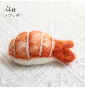 Detail of 4# shrimp sushi felt ornament with handmade wool texture, size 3.5x6.8cm