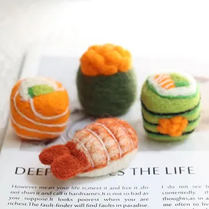 Handmade wool felt sushi keychain charms including nigiri and rolls with realistic texture