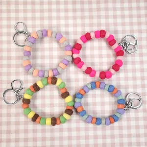 Handmade wool felt ball keychain bracelets in colorful assortments with metal lobster clasps
