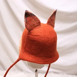 Handmade orange wool felt fox hat with cute animal ears and ties for winter warmth