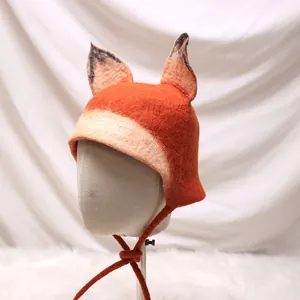 Handmade wool felt fox hat with cute orange ears and long ties for winter warmth