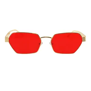 Retro geometric sunglasses with gold metal frame and vibrant red lenses for street style