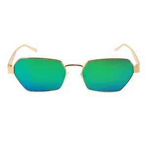 Fashionable geometric gold metal sunglasses with blue-green gradient lenses on white background