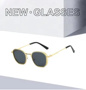 Close-up of golden metal hexagonal sunglasses frame with fine anti-slip textured details
