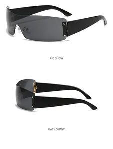 Détail des lunettes de soleil futuristes sans monture avec larges branches noires et charnières