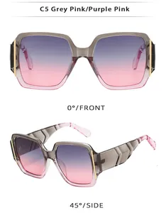 Detail view of square grey pink gradient sunglasses with elegant golden metal temples