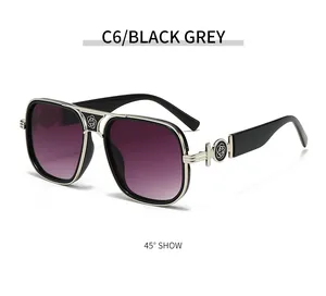 Detail of rectangular oversized sunglasses with C6 black grey frame and silver floral decor