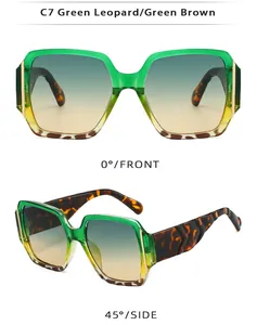 Detail view of square green gradient sunglasses with leopard print and gold metal accents