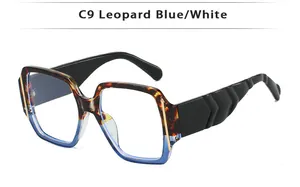 Detail of square sunglasses with leopard blue gradient frames and wavy textured temples