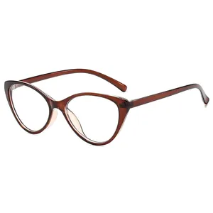 Gafas cat-eye anti-luz azul con montura de resina ámbar translúcida sobre fondo blanco