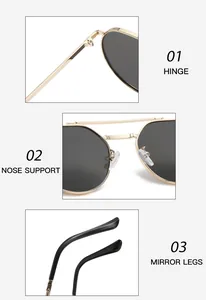 Detail view of gold metal frame sunglasses showing hinge, nose pads, and temple tips